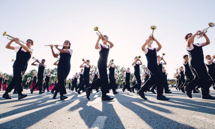Marching band movement across field markers