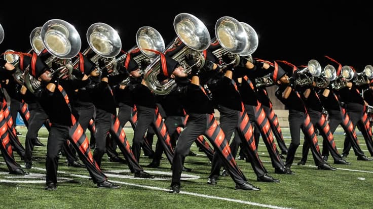 Striking nighttime tuba line leaning into low brass power arc
